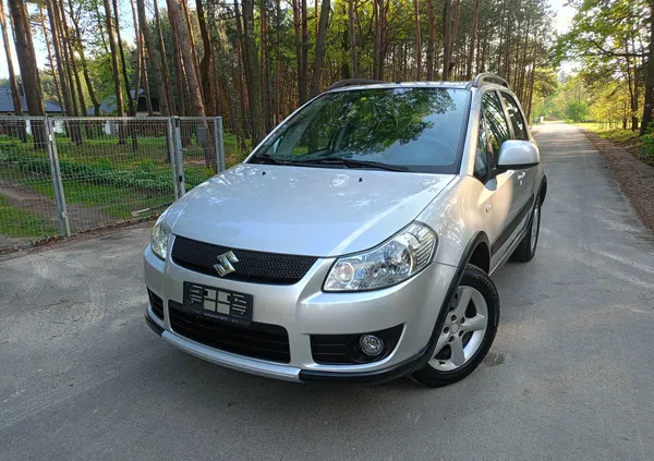 samochody osobowe Suzuki SX4 cena 26990 przebieg: 170000, rok produkcji 2009 z Stepnica